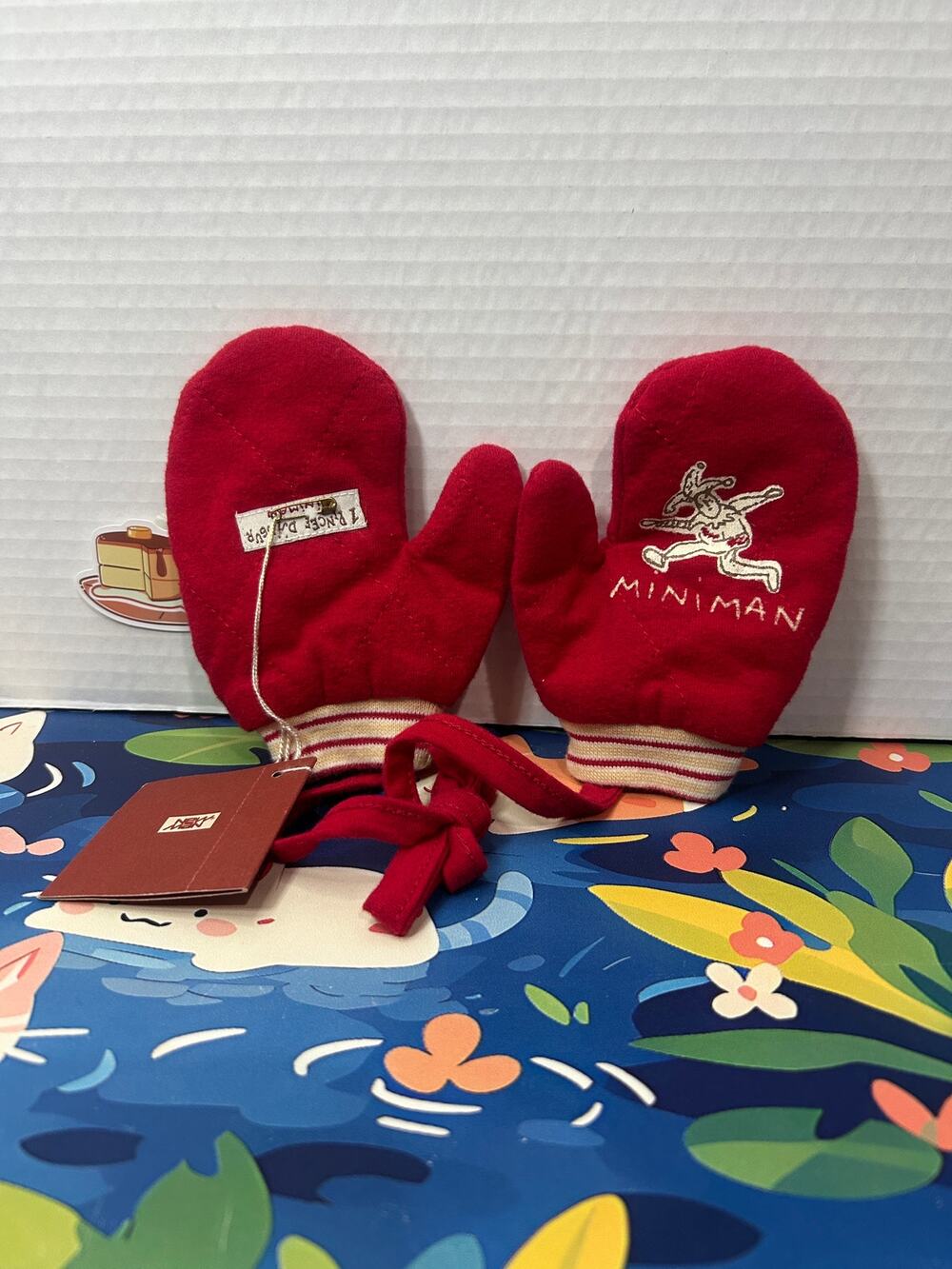 Red Miniman brand mittens for children